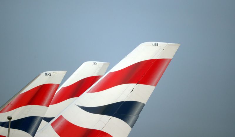 FILE PHOTO: British Airways logos are seen on tail fins