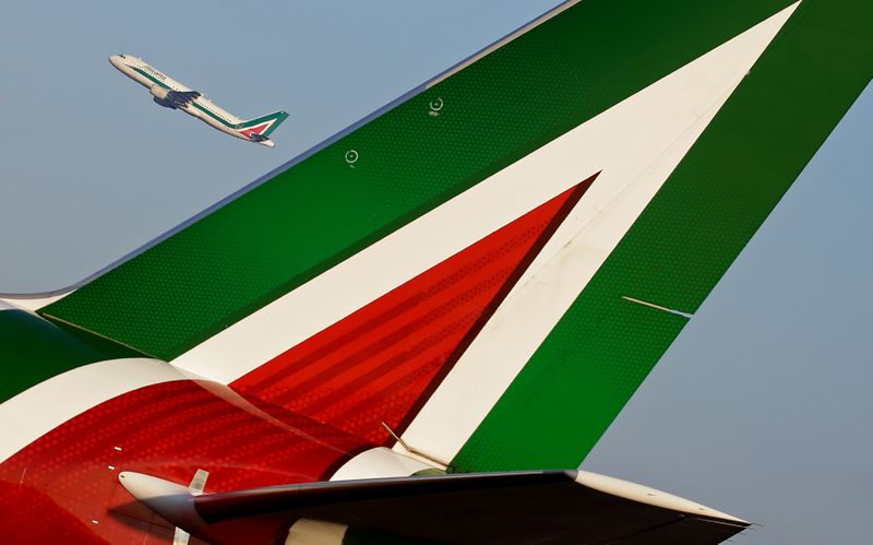 FILE PHOTO: An Alitalia Airbus A320 passenger aircraft takes off
