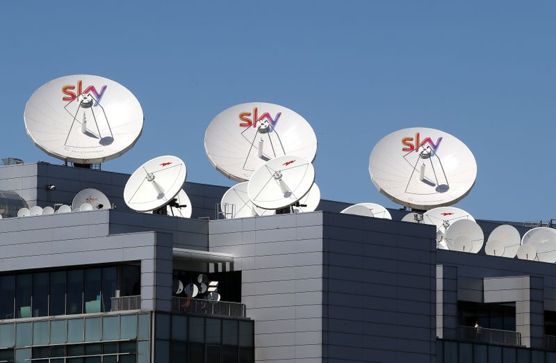 Sky parabolic antennas  are seen on roof of the