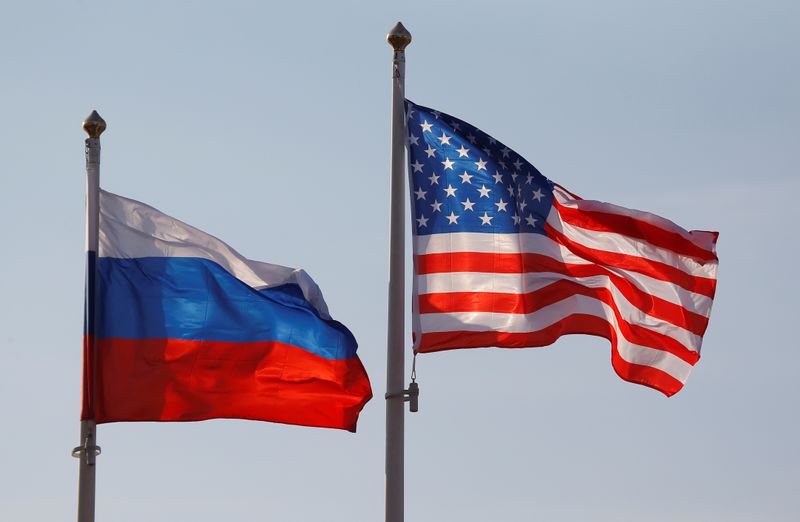 National flags of Russia and U.S. fly at Vnukovo International