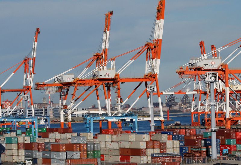 Containers are seen at an industrial port in Yokohama