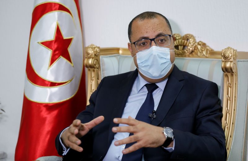 Tunisian Prime Minister Hichem Mechichi speaks during an interview with