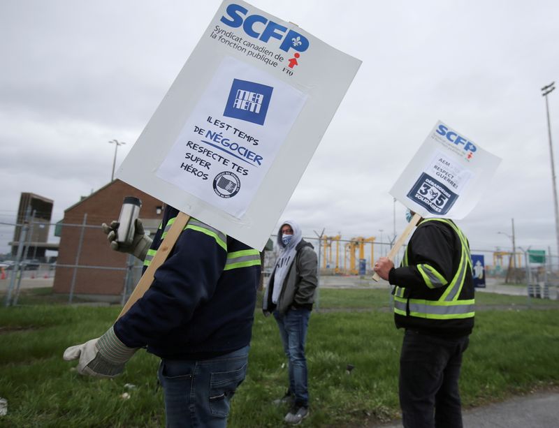 FILE PHOTO: Longshore workers strike in front of Port of
