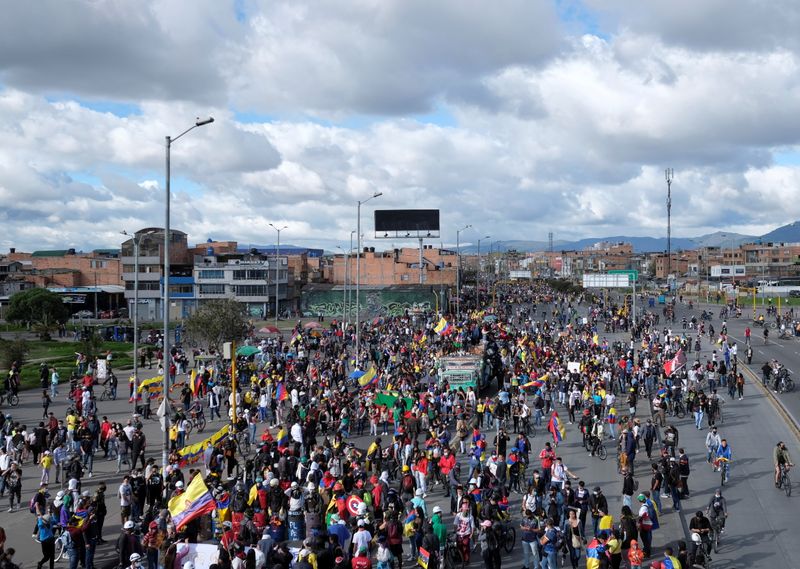 Demonstrators march during anti-government protests, as Colombia commemorates Independence Day,