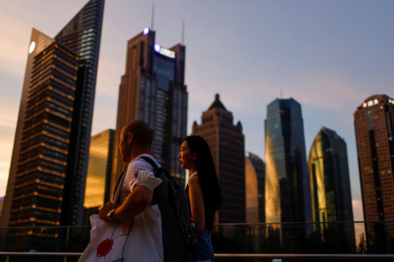 FILE PHOTO: Lujiazui financial district during sunset in Pudong, Shanghai