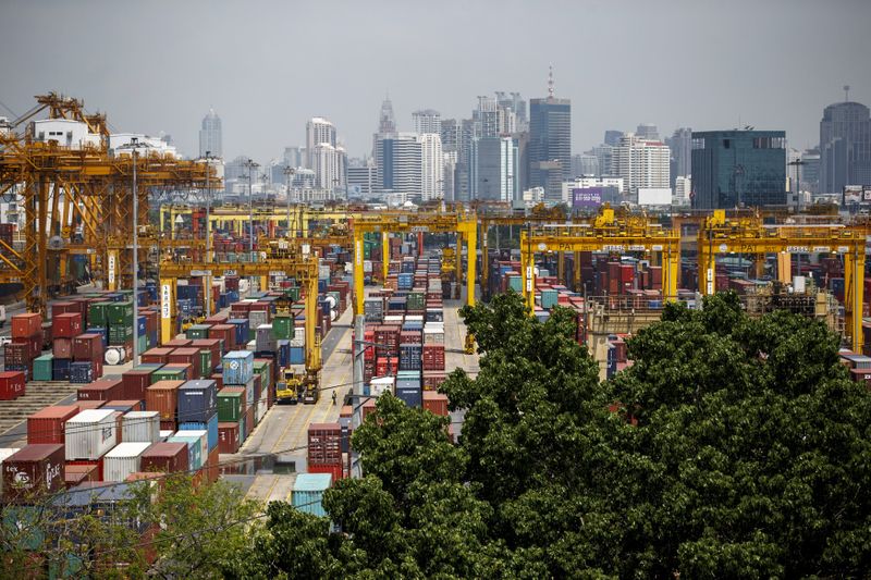 FILE PHOTO: Shipping containers stand at a port in Bangkok