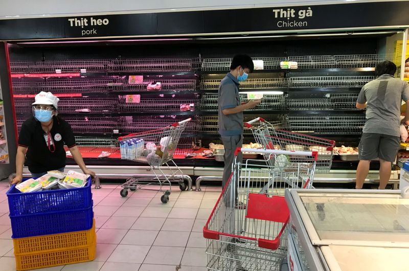 Food shelves stand empty due to panic buying amid COVID-19