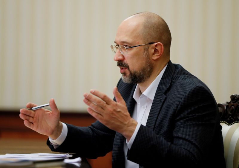 FILE PHOTO: Ukraine’s Prime Minister Shmygal speaks during an interview