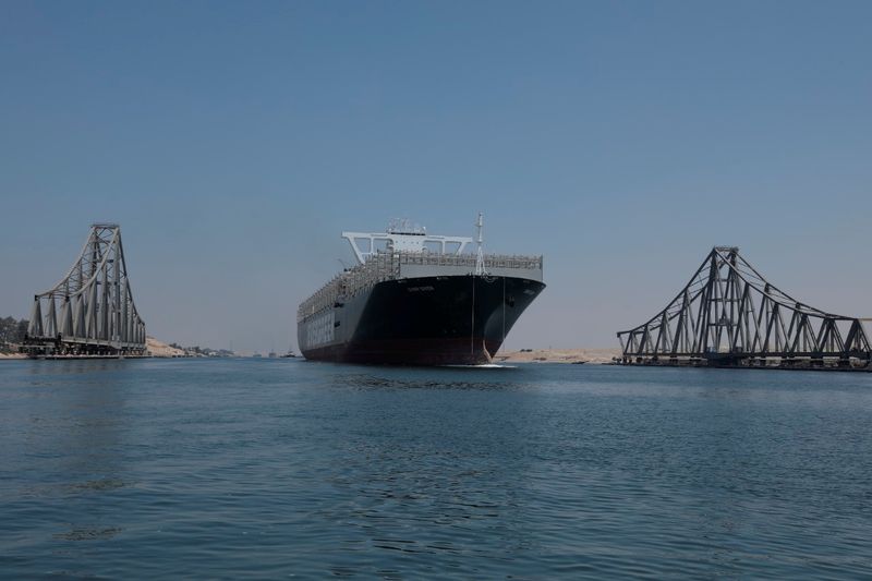 FILE PHOTO: Ever Given sails through Suez Canal in Ismailia