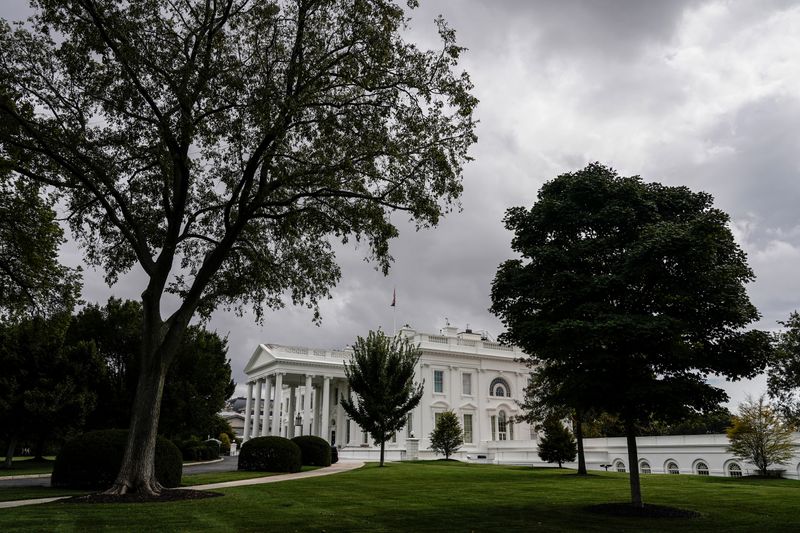 Clouds pass over the White House in Washington