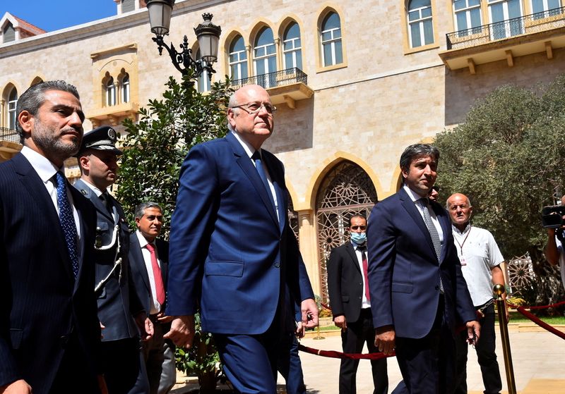 FILE PHOTO: Lebanon’s new Prime Minister Najib Mikati walks during