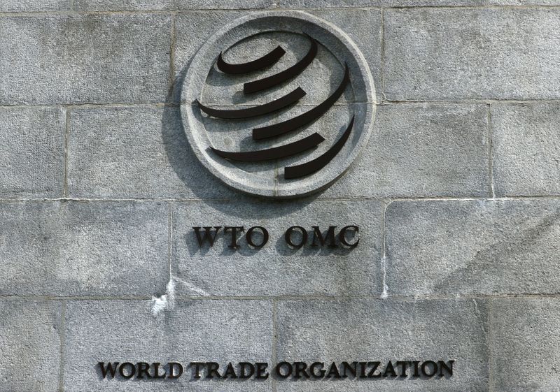 A logo is pictured outside the World Trade Organisation (WTO)
