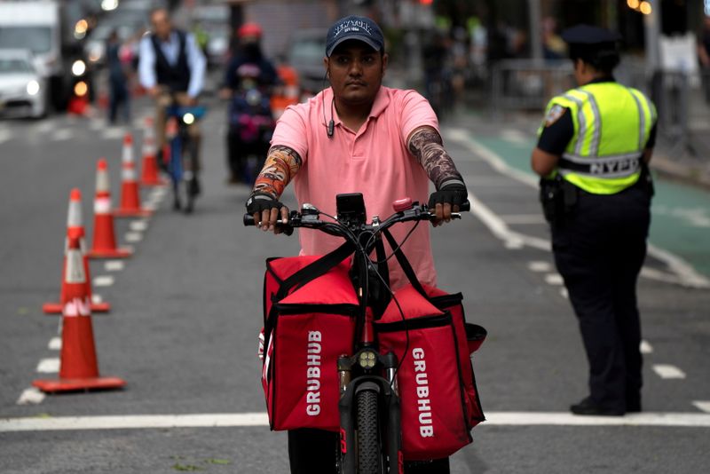 FILE PHOTO: A delivery worker is pictured in New York