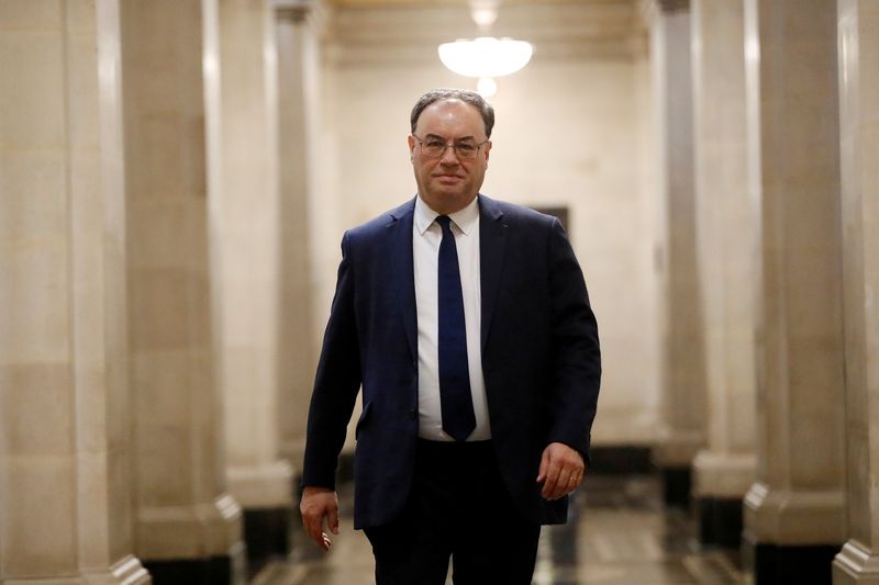 FILE PHOTO: Bank of England Governor Andrew Bailey poses for
