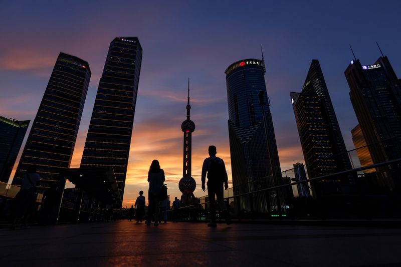 Lujiazui financial district during sunset in Pudong, Shanghai
