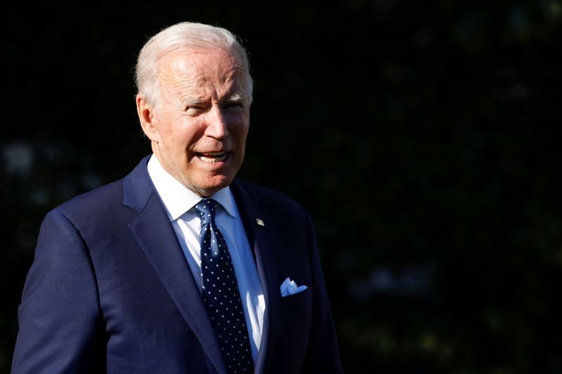 U.S. President Biden speaks briefly with reporters at the White