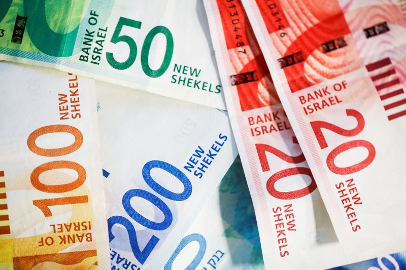FILE PHOTO: New Israeli Shekel banknotes are seen in this