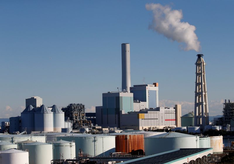 FILE PHOTO: Chimneys are pictured in an industrial area in