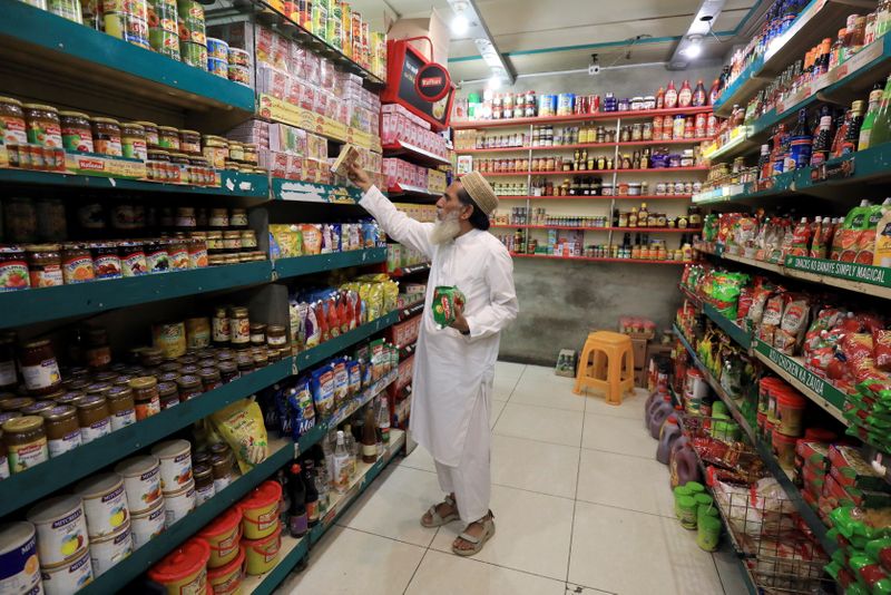 FILE PHOTO: Man shops for grocery items in Peshawar
