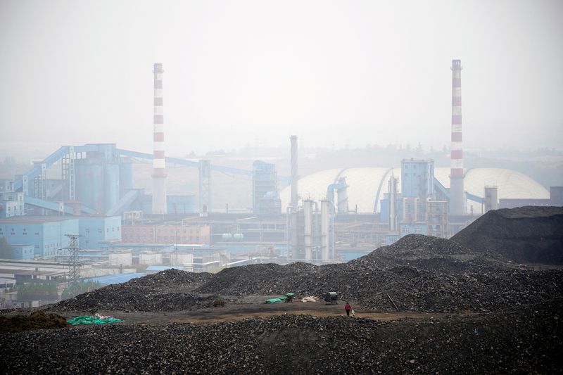 Dunes of low-grade coal are seen near a coal mine