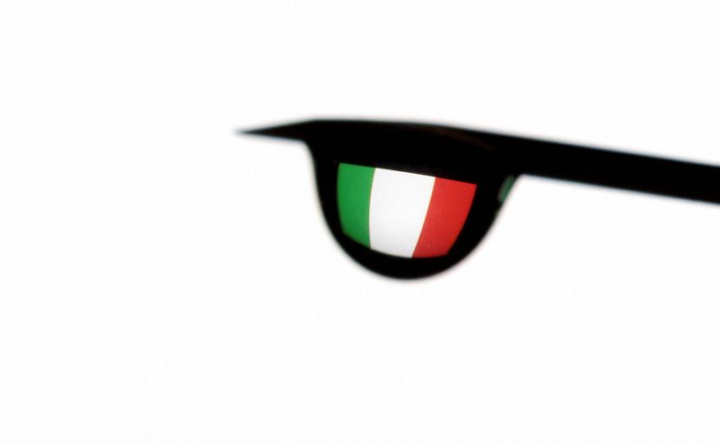 FILE PHOTO: Illustration shows the flag of Italy reflected in