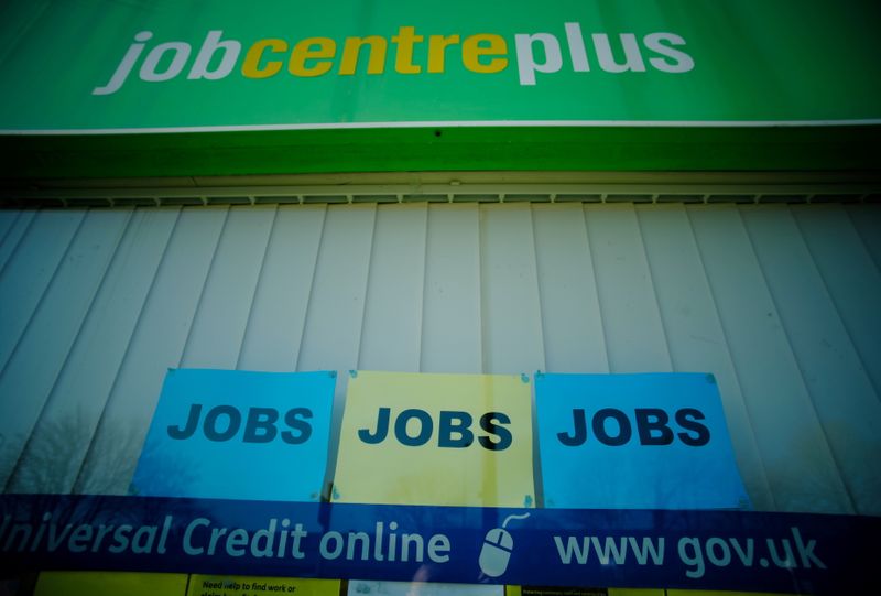 Adverts for jobs are seen in the window of a