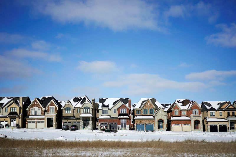 FILE PHOTO: A row of houses stand in a subdivision