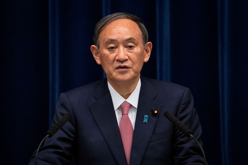 Japanese Prime Minister Suga holds a news conference, in Tokyo
