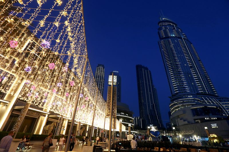 FILE PHOTO: People walk outside The Dubai Mall in Dubai
