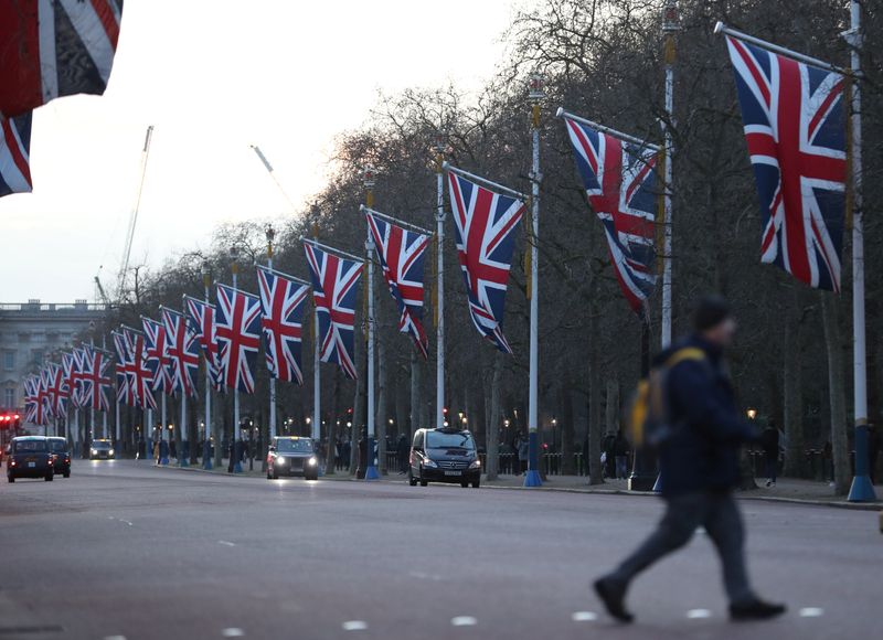 A Britain flags are seen in The Mall street in