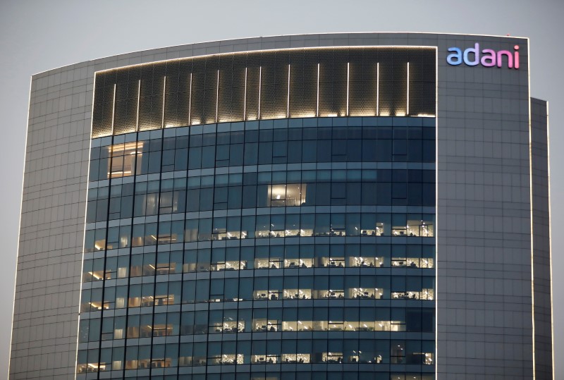 The logo of the Adani Group is seen on the