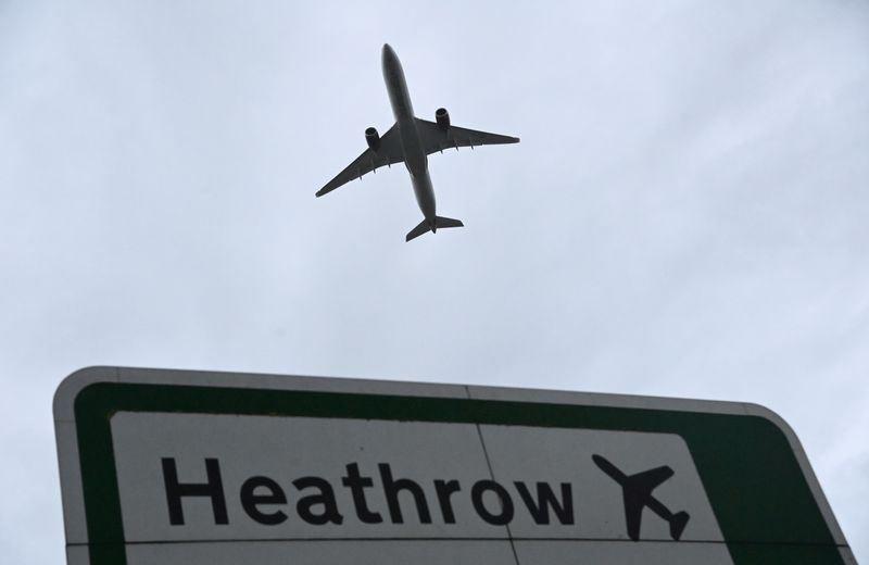 FILE PHOTO: Aircraft takes off at Heathrow Airport amid COVID-19