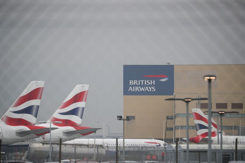 Parked British Airways planes are seen at Heathrow Airport in