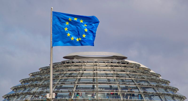 The European Union flag is seen above the cupola of