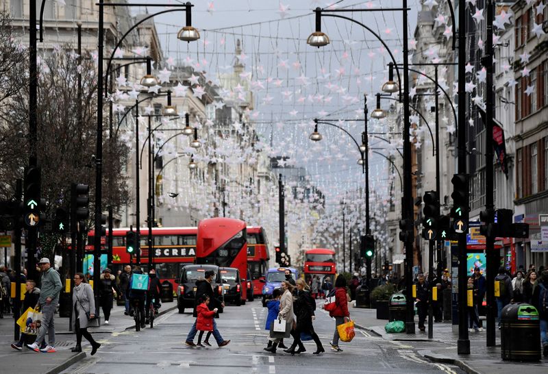 FILE PHOTO: Shoppers cross Oxford StreetLondon