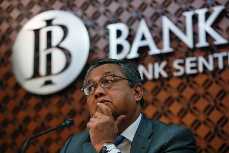 Bank Indonesia Governor Perry Warjiyo gestures during a press conference