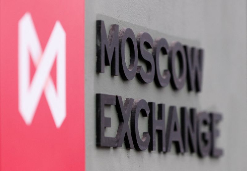 A board with the logo of the Moscow Exchange is