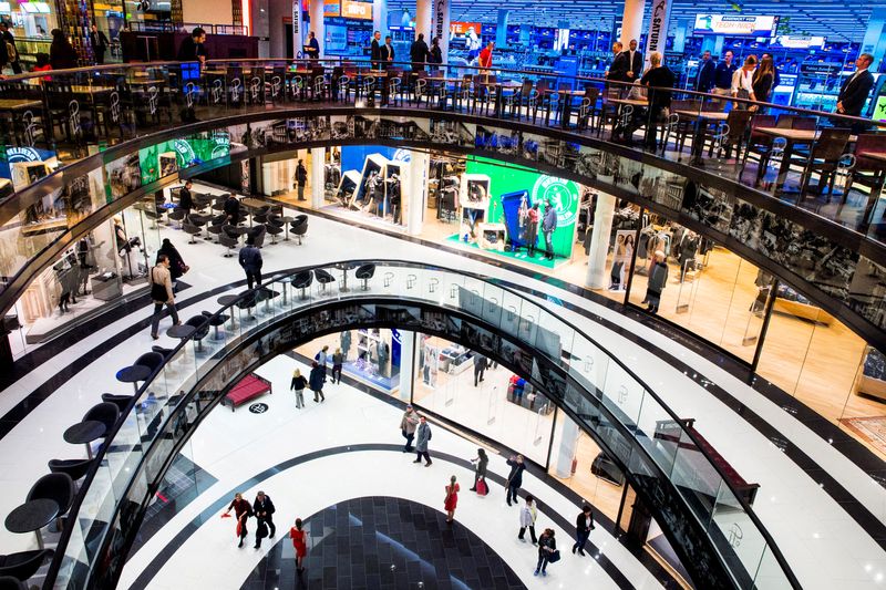 People walk through Mall of Berlin shopping centre during its