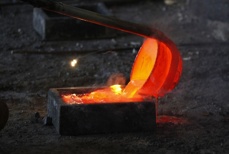 Molten rare earth metal Lanthanum is poured into a mould