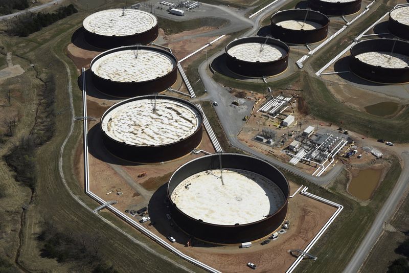 FILE PHOTO: Crude oil storage tanks are seen from above