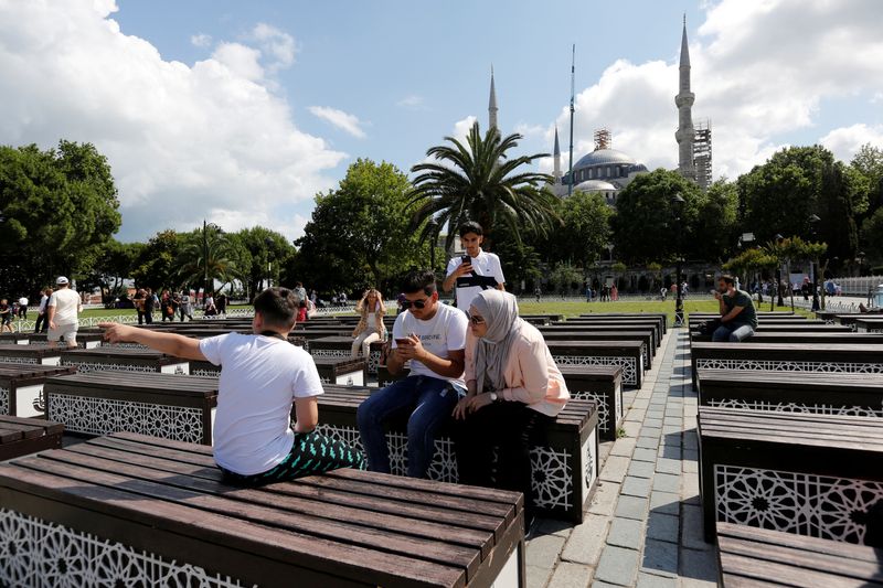 FILE PHOTO: Foreign tourists visit Istanbul’s Old City