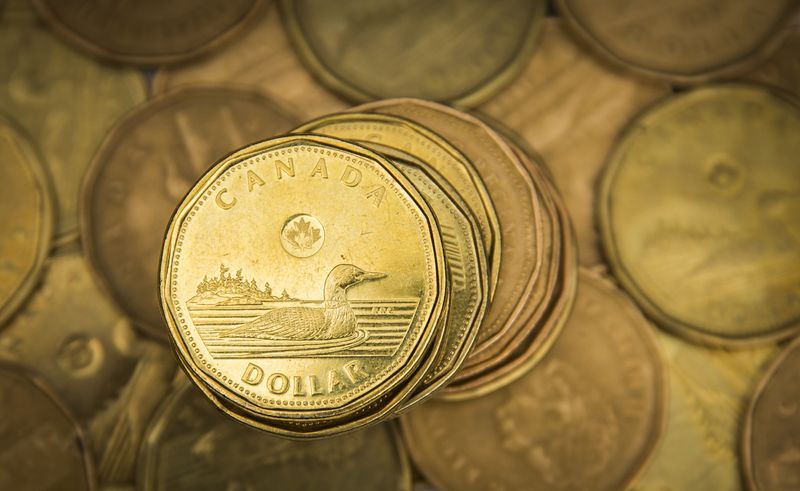 FILE PHOTO – A Canadian dollar coin, commonly known as