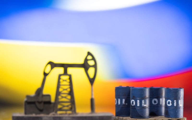 Models of oil barrels, pump jack and displayed Ukrainian and