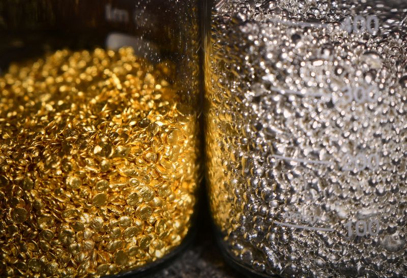 Granules of gold and silver are seen in glass jars