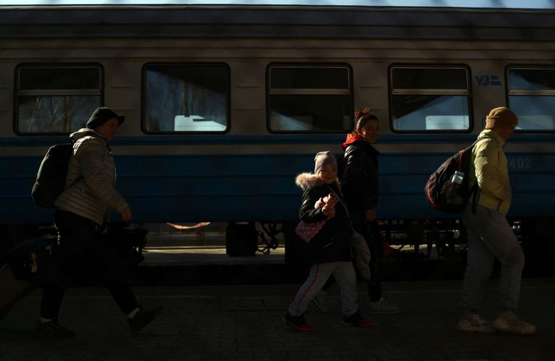 FILE PHOTO: People fleeing from Russia’s invasion of Ukraine, in