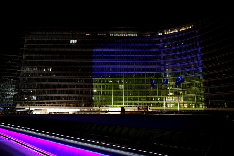 FILE PHOTO: European Commission is illuminated in Ukrainian colours, in