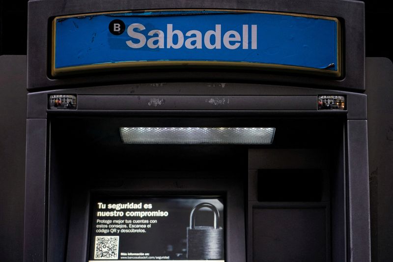 FILE PHOTO: Sabadell bank’s logo is seen at an ATM