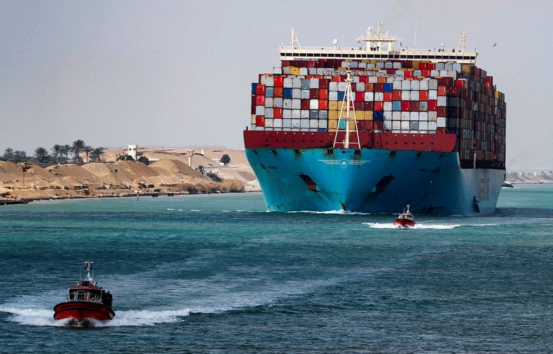FILE PHOTO: A shipping container passes through the Suez Canal
