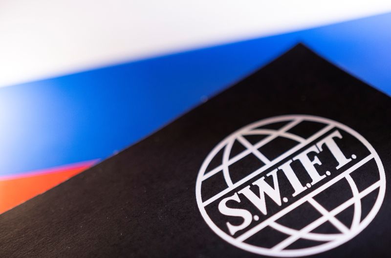 Illustration shows Swift logo and Russian flag