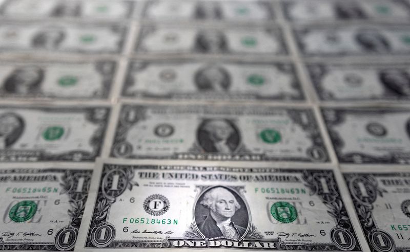 FILE PHOTO: Illustration shows U.S. dollar banknotes